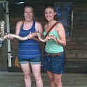 Julia and I holding a black headed python